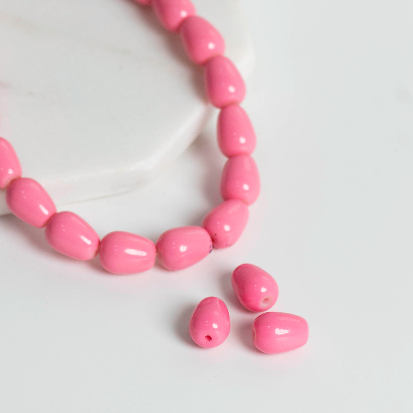 Glossy Pink Oval Beads | Size : 12mm | Qty : 5 line-approx 45pcs | GB23