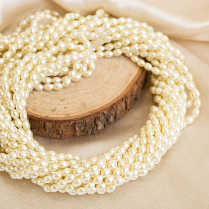 Oval Shape 2 Hole Pearl Beads | Size : 4mm | Qty : 1 Bunch (Approx 1200pcs) | PC65