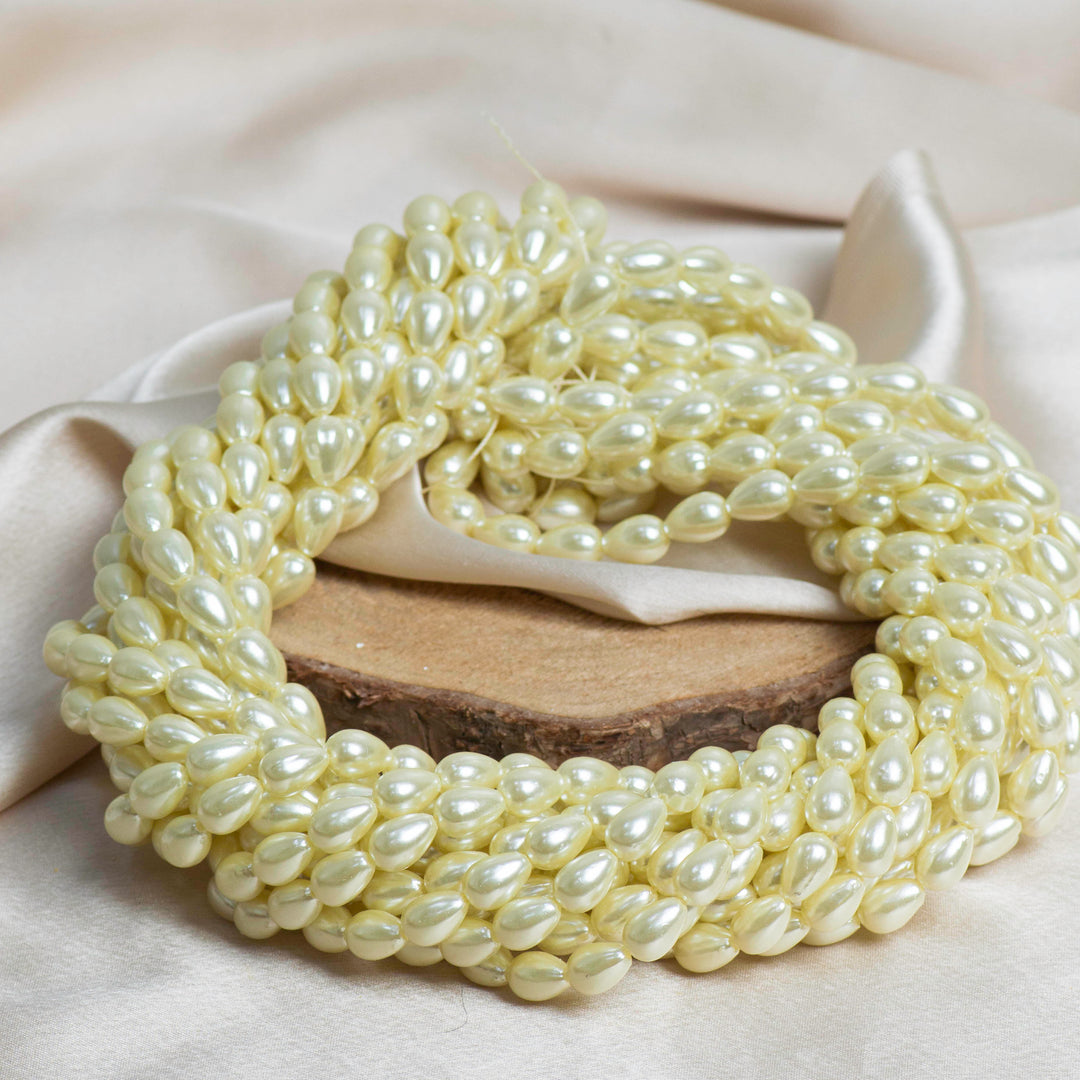 Drop Shape 2 Hole Pearl Beads | Size : H-11mm W-7mm-(10 No.) | Qty : 1 Bunch (Approx 1200pcs) | PC73