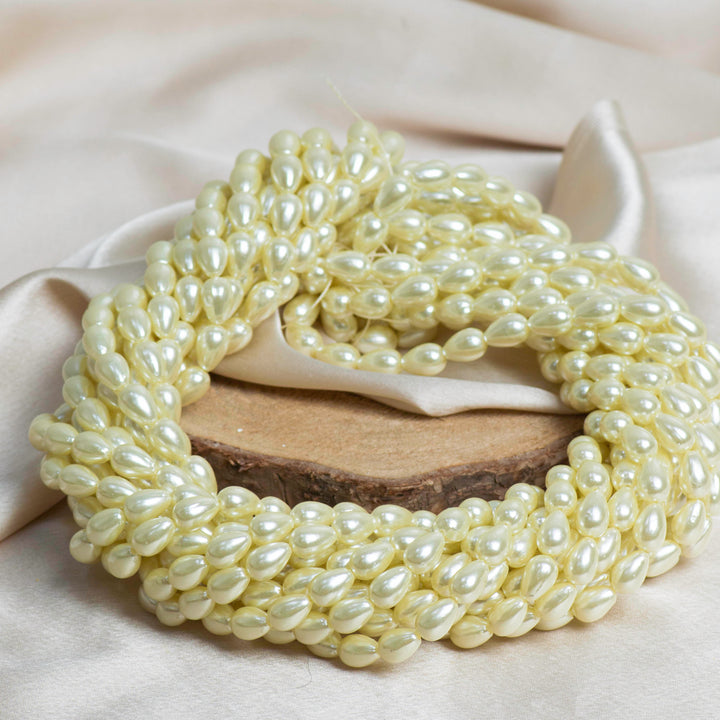 Drop Shape 2 Hole Pearl Beads | Size : H-11mm W-7mm-(10 No.) | Qty : 1 Bunch (Approx 1200pcs) | PC73